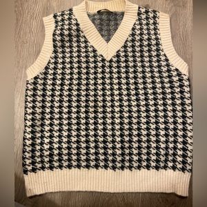 Good quality barely worn Black and Tan plaid sweater vest.